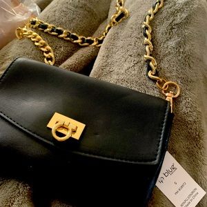 Small black crossbody. New, never used